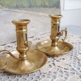 Paire de bougeoirs rat de cave en laiton