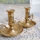 Pair of brass cellar rat candlesticks