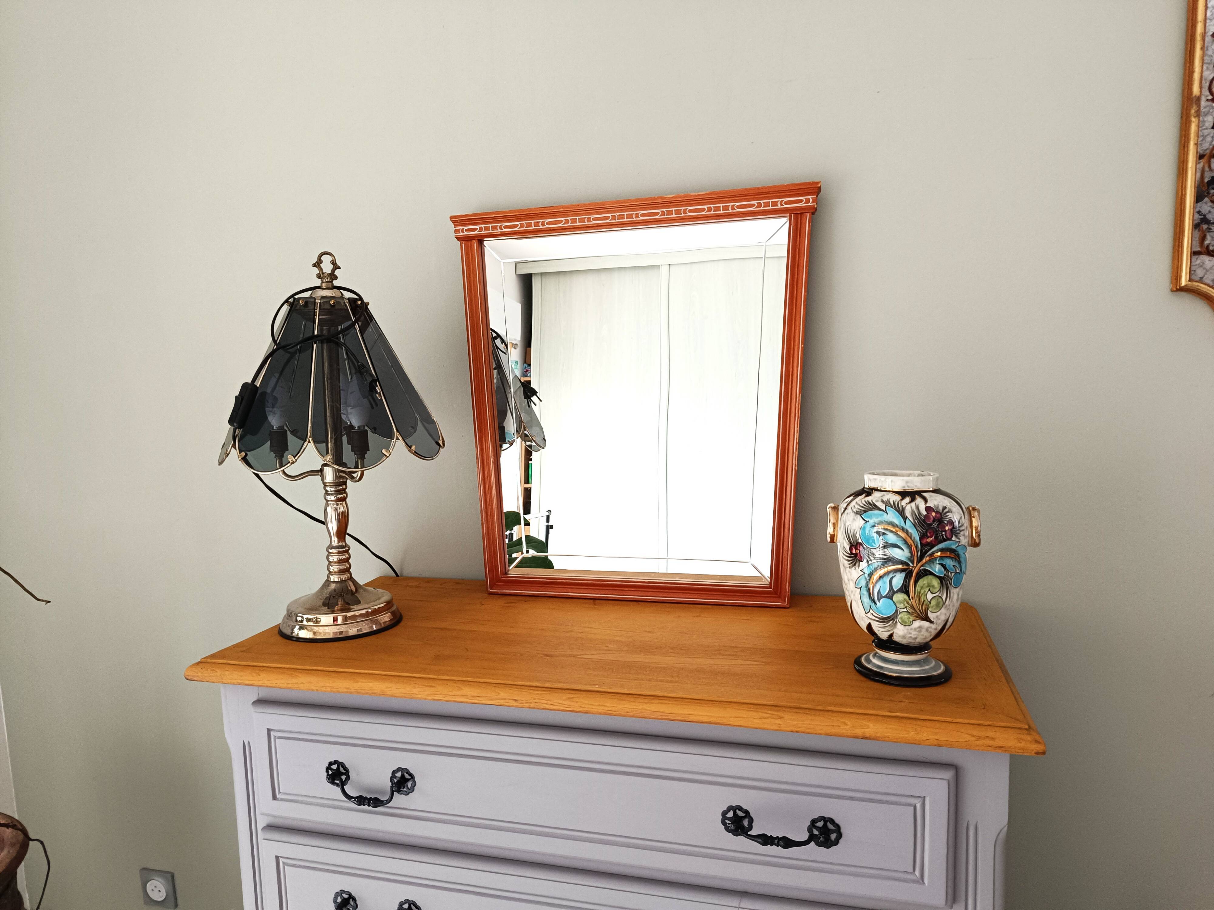 Beveled glass wall mirror in solid wood frame