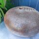 Vintage sandstone vase, in the shape of a rugby ball, signed