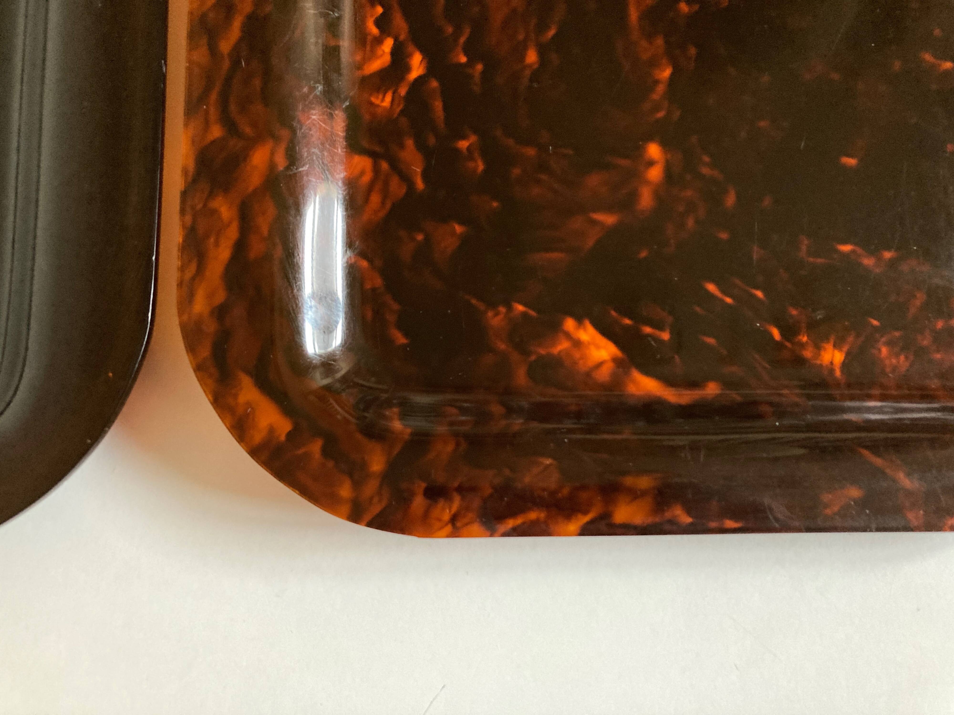 Pair of tortoiseshell lucite trays 1970