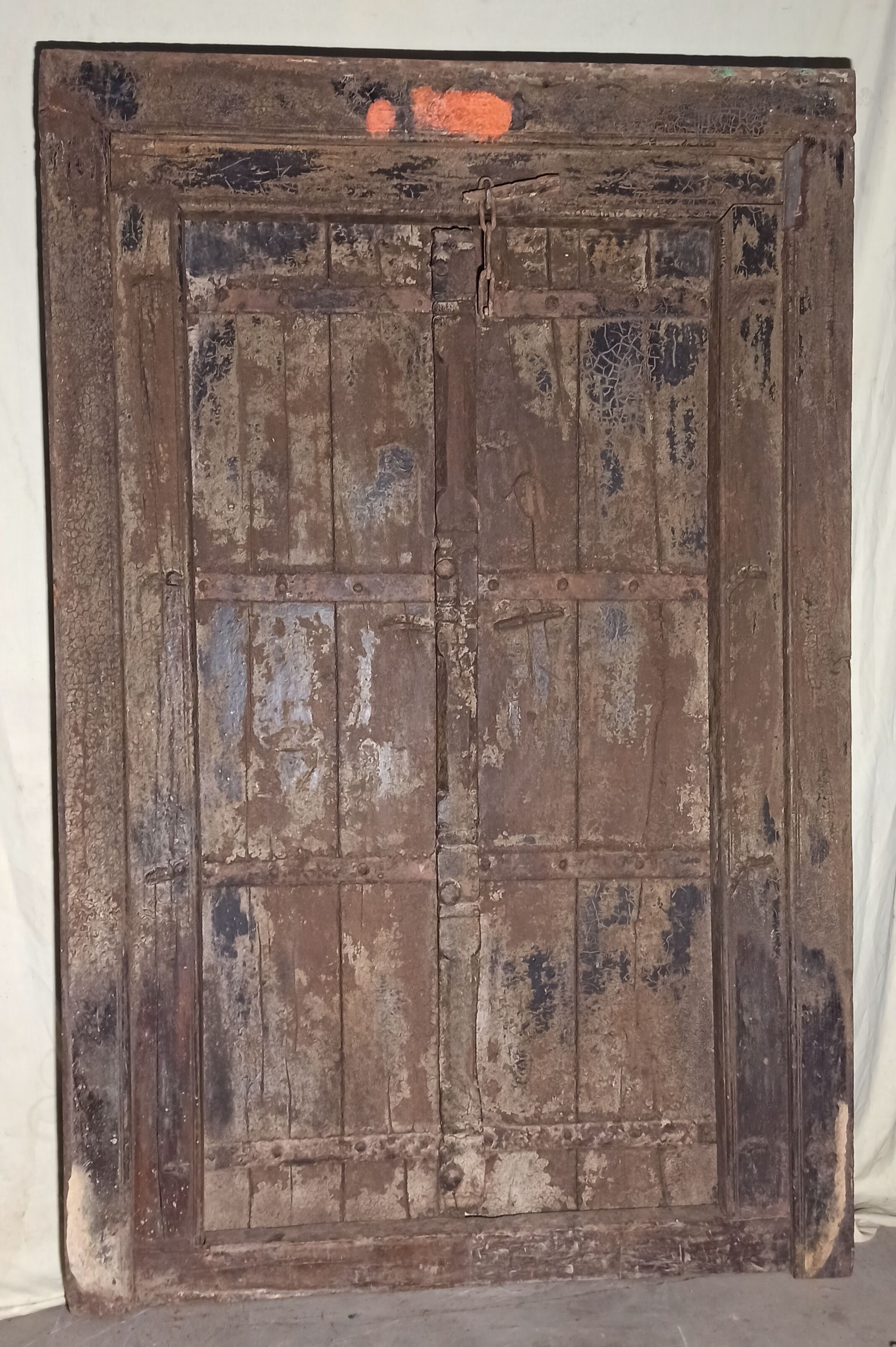 Old wooden door with frame