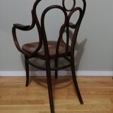 Fauteuil canné en bois courbé signé J.Kohn