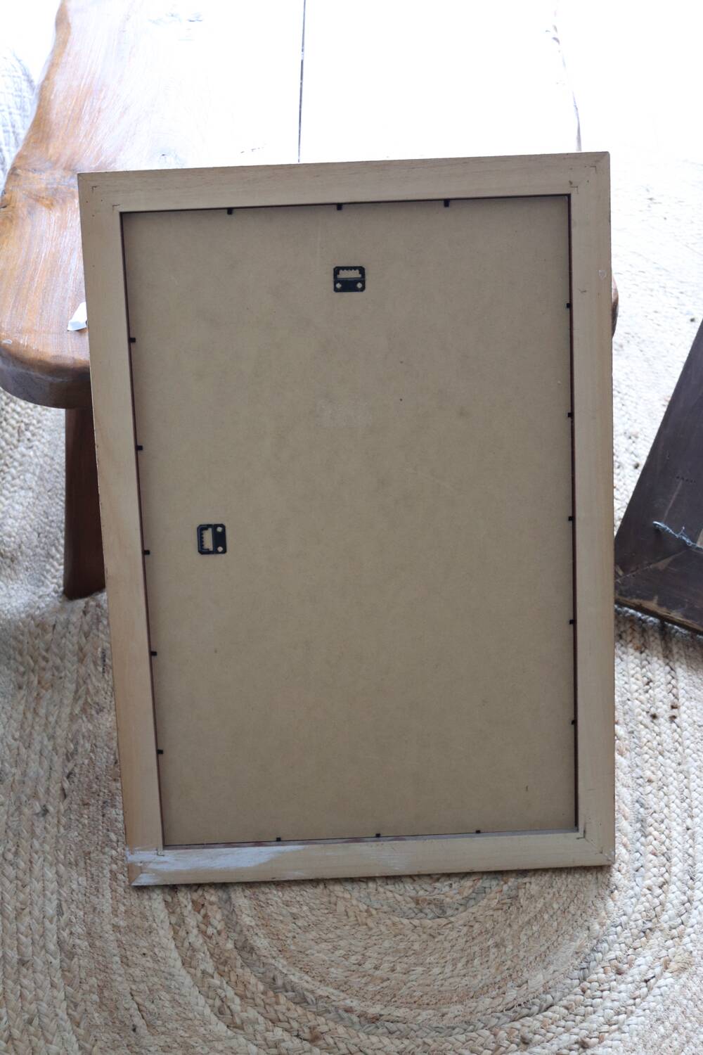 Rectangular gold mirror with moulded decoration.