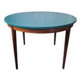 Extendable oval teak dining table