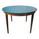 Extendable oval teak dining table