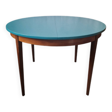Extendable oval teak dining table