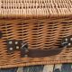 Picnic basket with white porcelain crockery