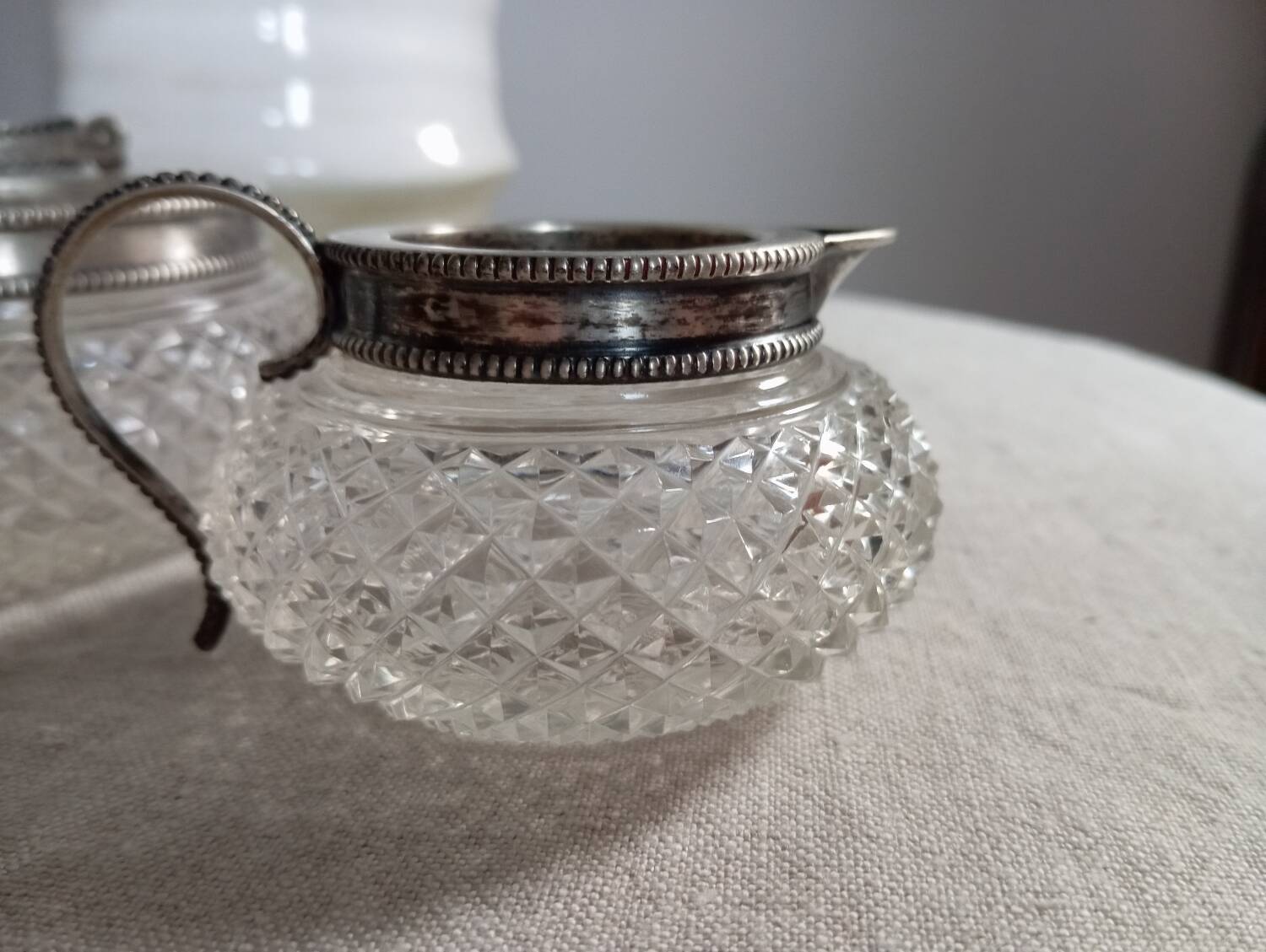 Creamer and jam maker in diamond-point crystal and silver rim, circa 1930