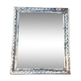 Old mercury mirror, in carved wood with silver leaf.