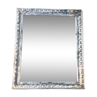 Old mercury mirror, in carved wood with silver leaf.