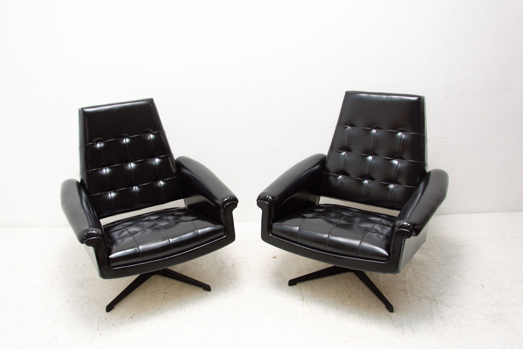 Pair of leather swivel armchairs from UP Zavody, 1970´s