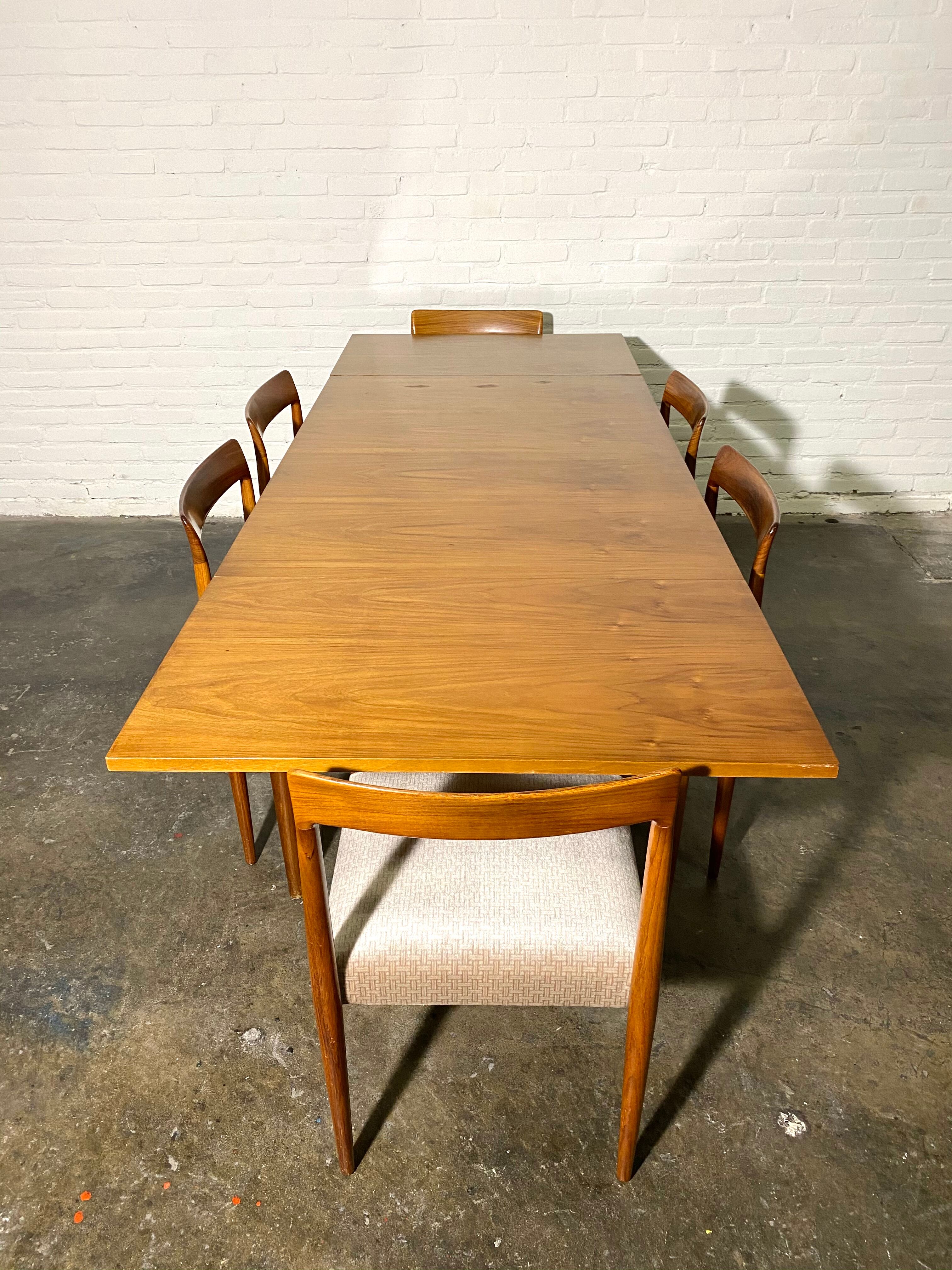 Vintage teak square extendable  dining table designed and manufactured by lübke,  1960s