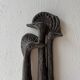 Brutalist wall sculpture with birds Ars Munda