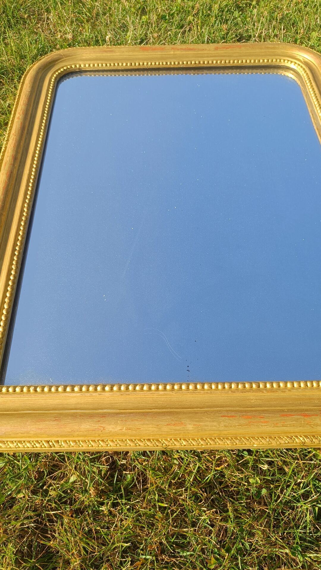 Antique gilded patinated Louis-Philippe mirror