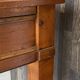 Occasional table in cherry wood, 1 drawer, 1 cane shelf, 1950.
