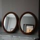 Paire de miroirs anciens ovales