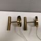 A set of stylish brass wall lamps from Danish Darø