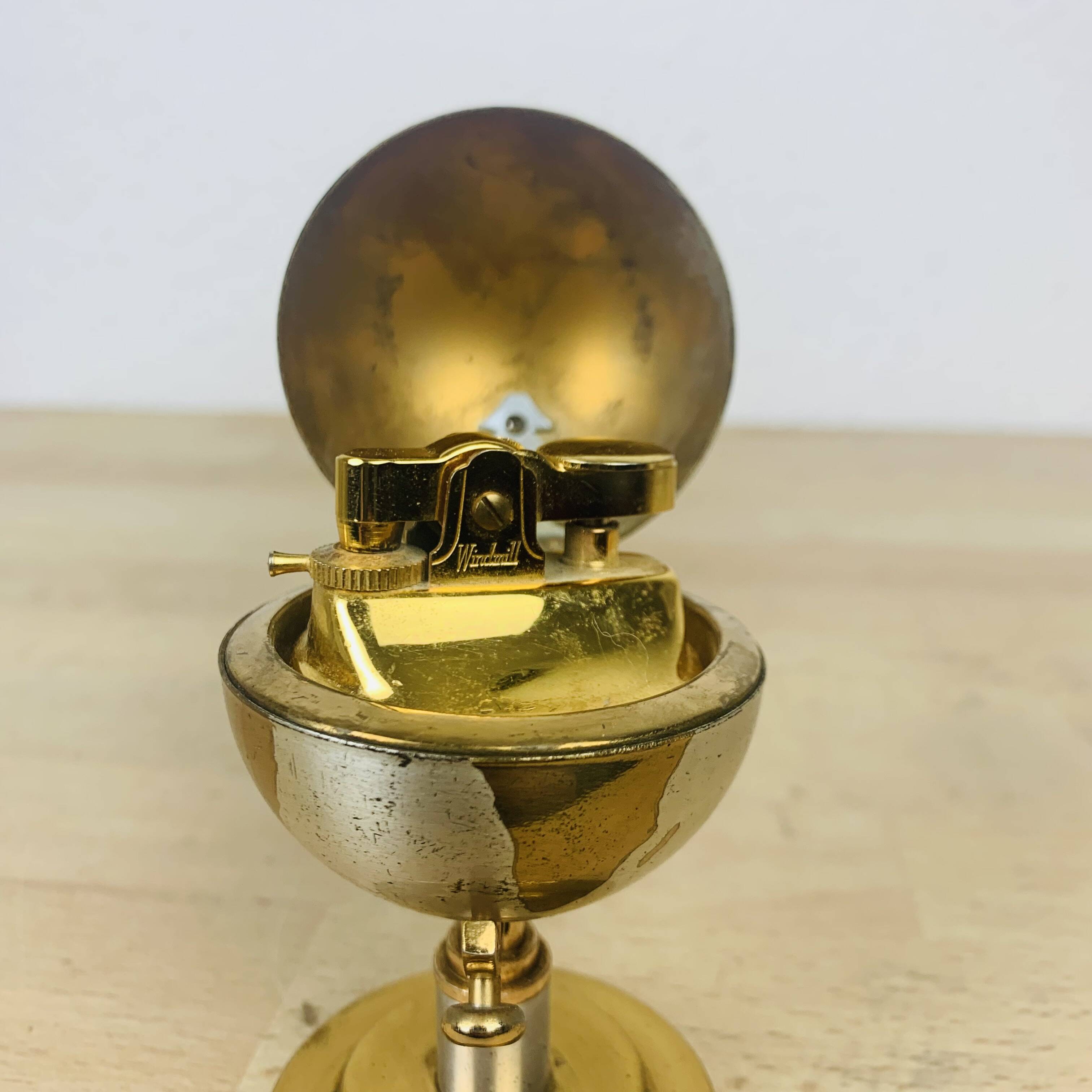 Vintage brass globe lighter