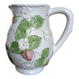 Barbotine pitcher with pastel flower decoration