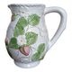 Barbotine pitcher with pastel flower decoration