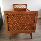 Rattan bed with compass feet