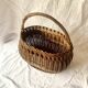 Old woven wicker basket and scoubidou