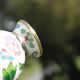 Two small vintage cloisonné enamel vases with Asian floral decoration.