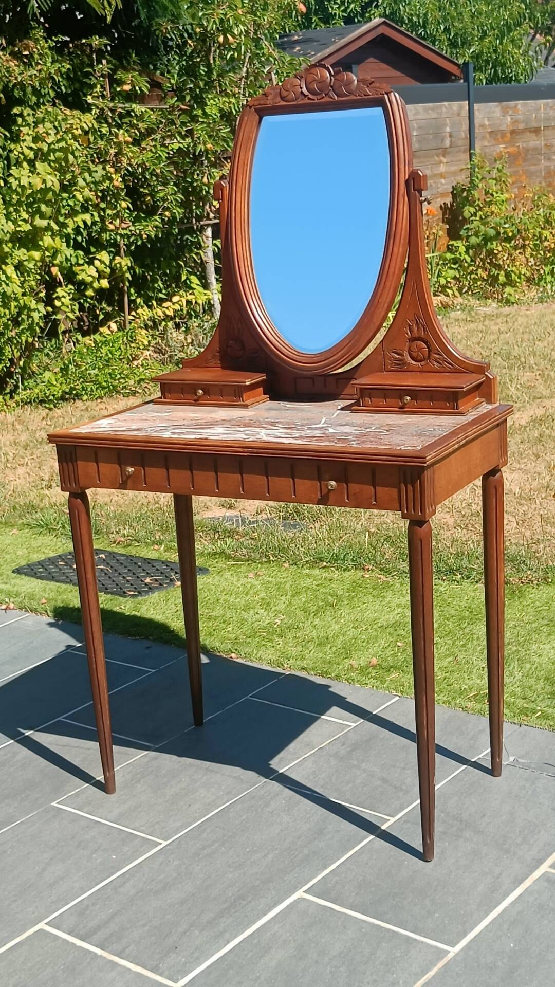 Art Deco oak dressing table, marble top and swivel mirror.