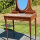 Art Deco oak dressing table, marble top and swivel mirror.