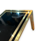 Coffee table in gilded brass and black glass by Studio Mercier for Liwan's