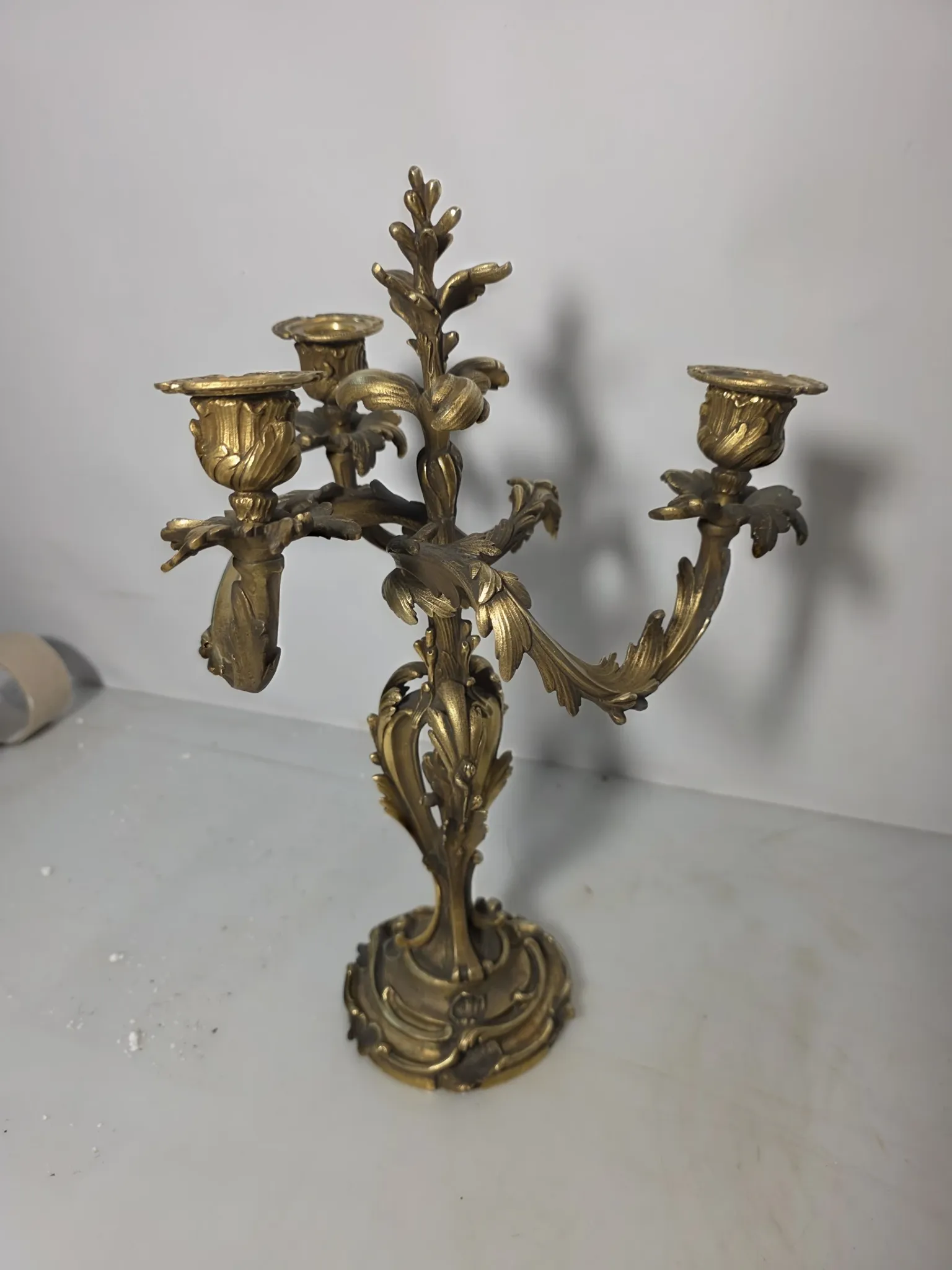 Pair of Louis XV style bronze candlesticks from the 19th century.
