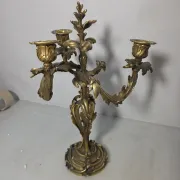 Pair of Louis XV style bronze candlesticks from the 19th century.