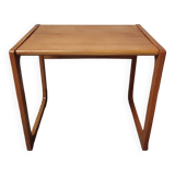 Sled-shaped side table