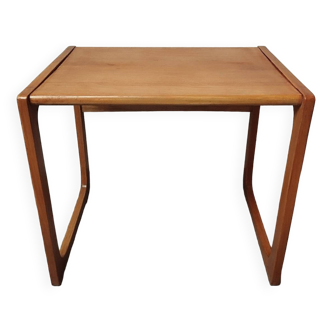 Sled-shaped side table