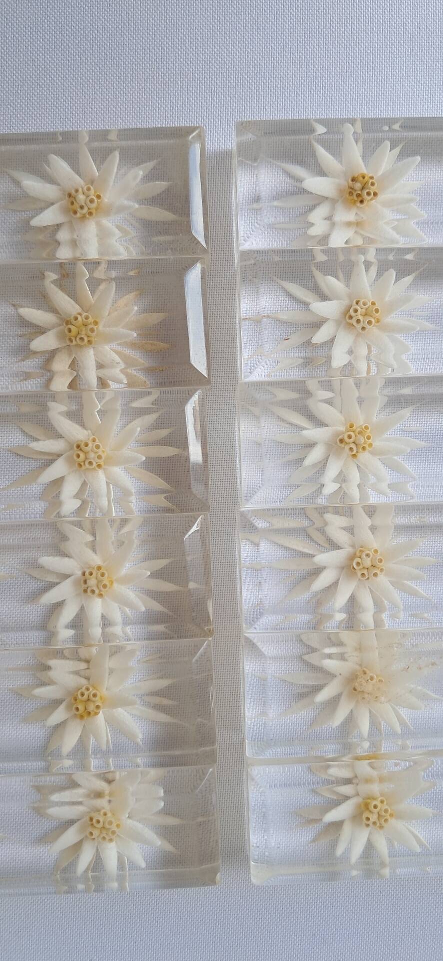 12 knife rests with resin inclusion. 1970s.