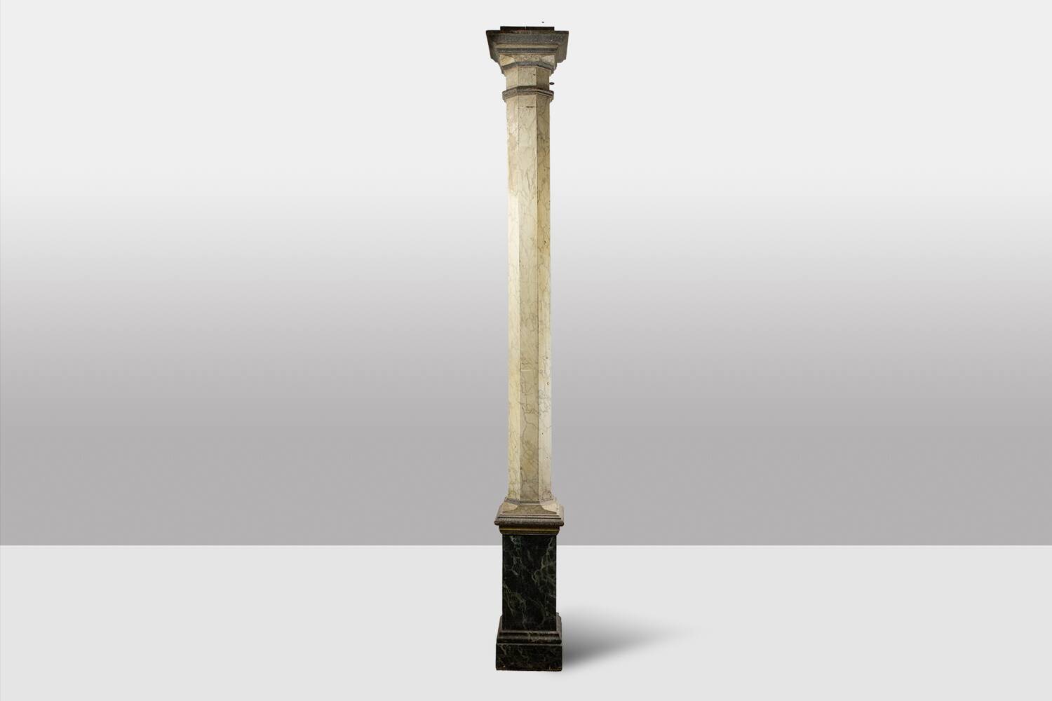 Pair of wooden columns painted to imitate marble. 1880s.