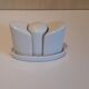 Set salt shaker, pepper tree and covered ceramic pot on small tray
