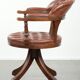 Swivel cowhide English style chesterfield office chair in a brown colour