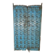 Old blue wooden door with braces