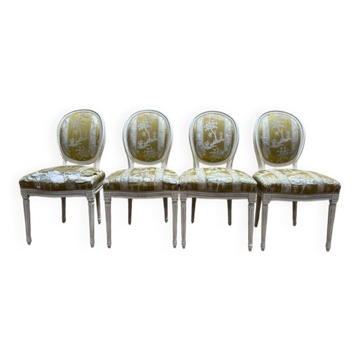 4 chaises médaillons de style Louis XVI rechampi blanc cassé
