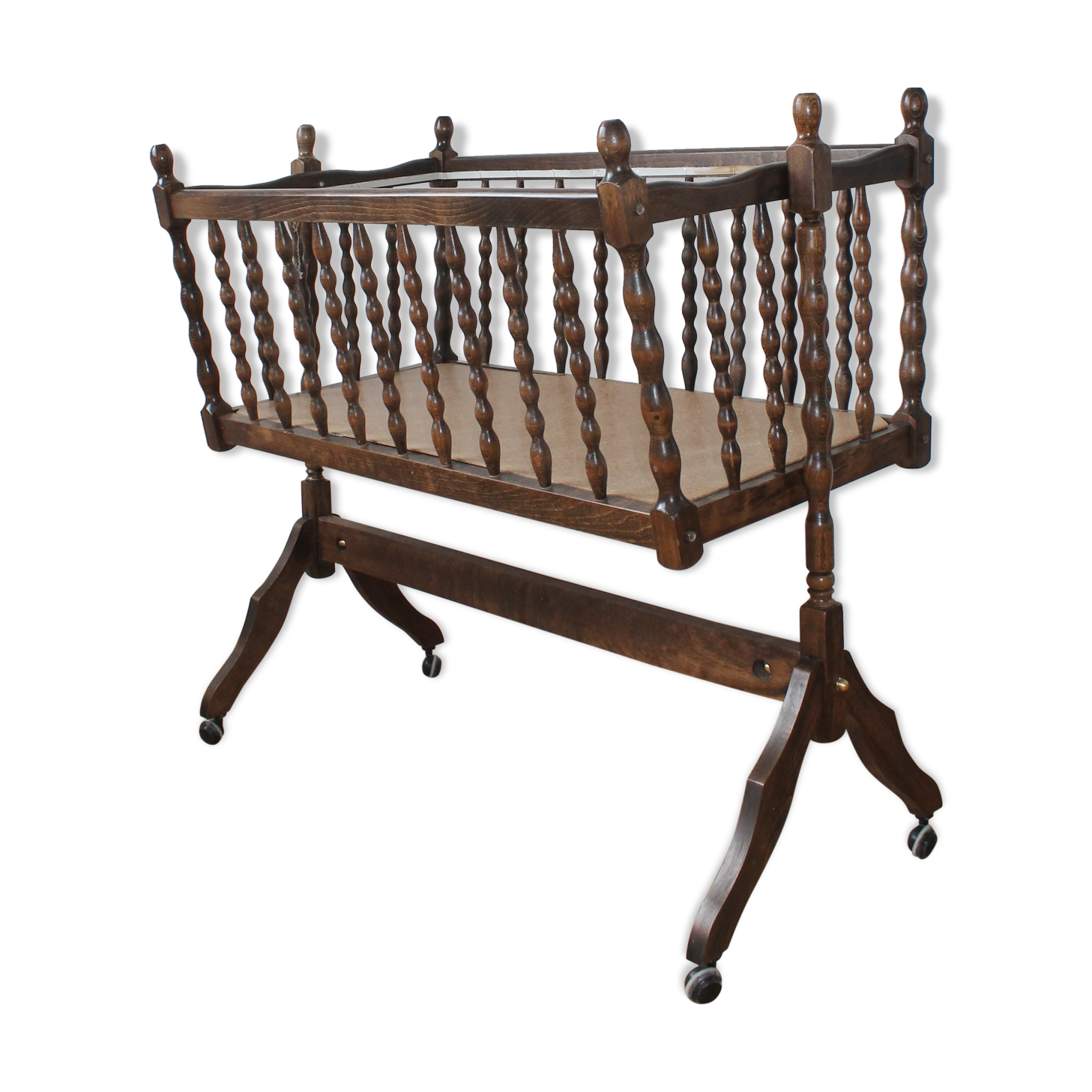 Old Vintage cradle with balance on wheels