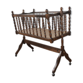 Old Vintage cradle with balance on wheels