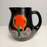 Brown ceramic pitcher with coloured patterns signed Bresse.