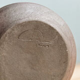 Small hand-held candlestick, signed