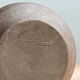 Small hand-held candlestick, signed