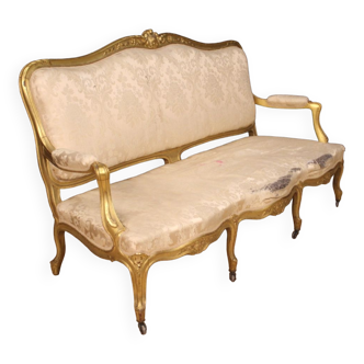 French golden sofa in Louis XV style from 20th century