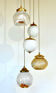 Large cascading pendant light in amber and opaline Murano glass