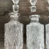 Set of 4 molded crystal bottles – Val Saint Lambert