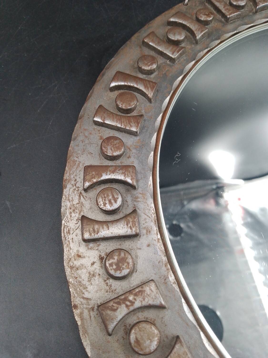 Beautiful brutalist round iron mirror in the RYCKAERT style ATELIER MAROLLES JEAN TOU